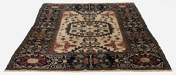 An antique Malajir rug, c. 179,5 x 124 cm (as well as one end with 2.5 cm flat weave).