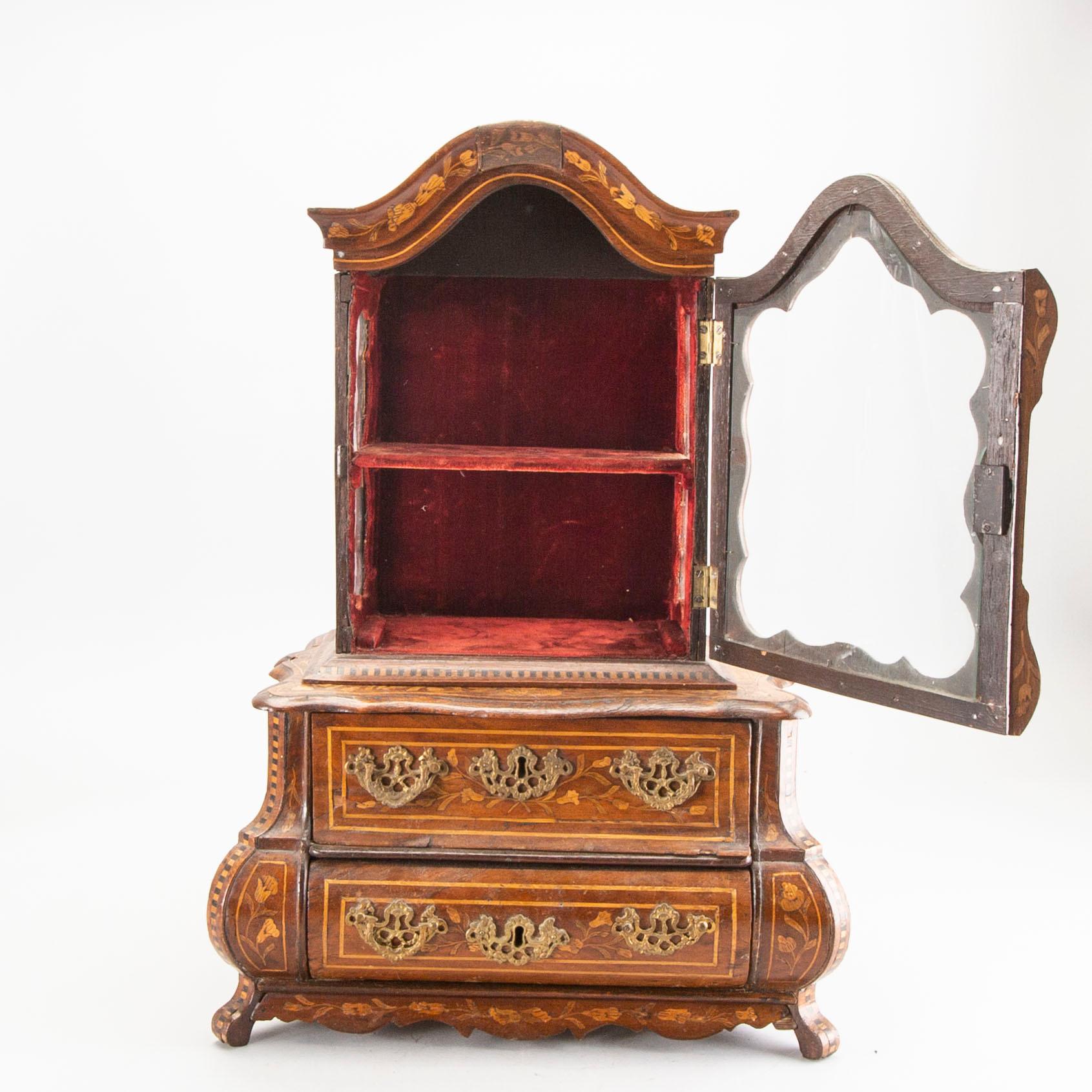 A Louis XV-style miniature cabinet around 1900.