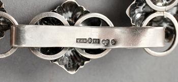 BROSCHER samt ARMBAND, silver, 11 delar, 1900-tal: Tot. vikt ca 169 gram.