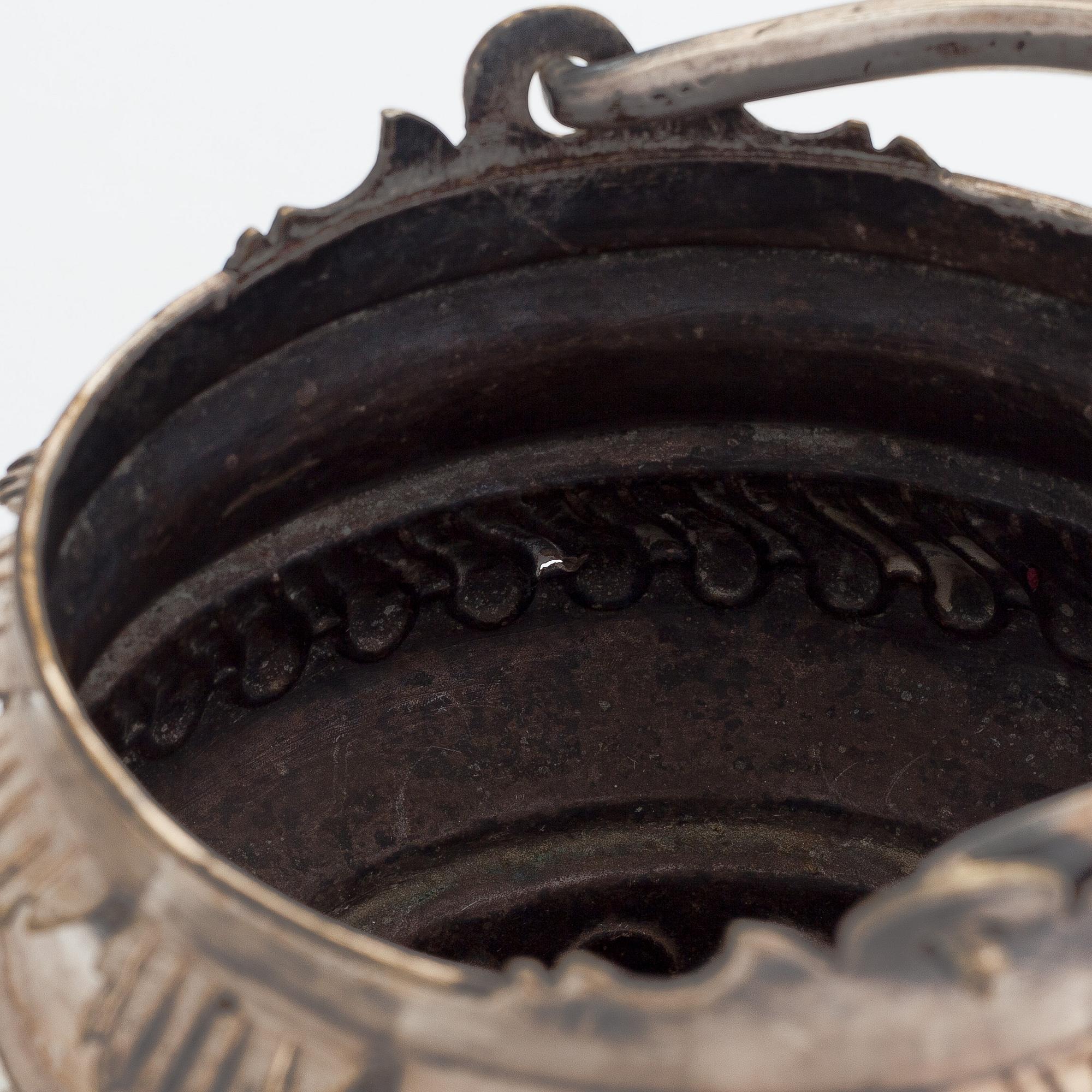 A silver plated brass Holy water bowl stamped L.G and dated 1774.