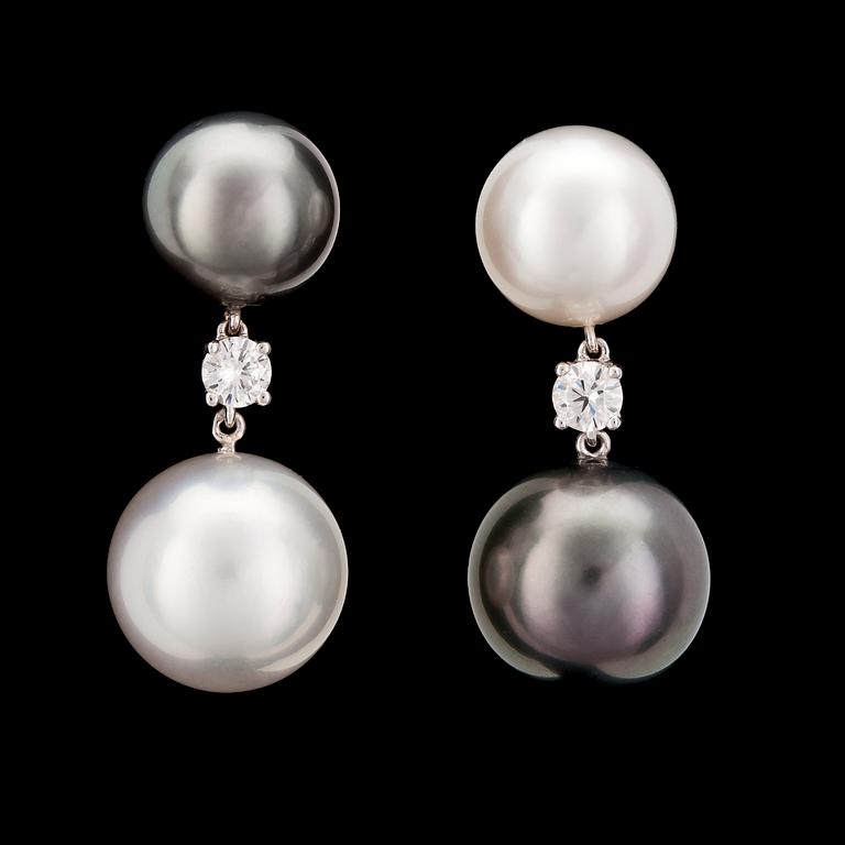 A pair of cultured Tahiti and South sea pearl earrings.