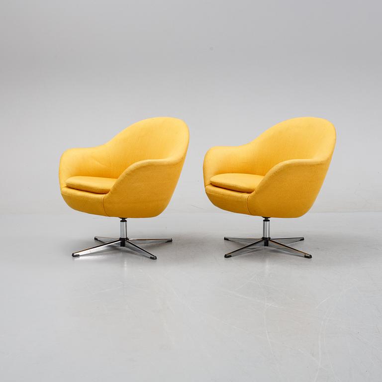 A pair of easy chairs, mid 20th Century.