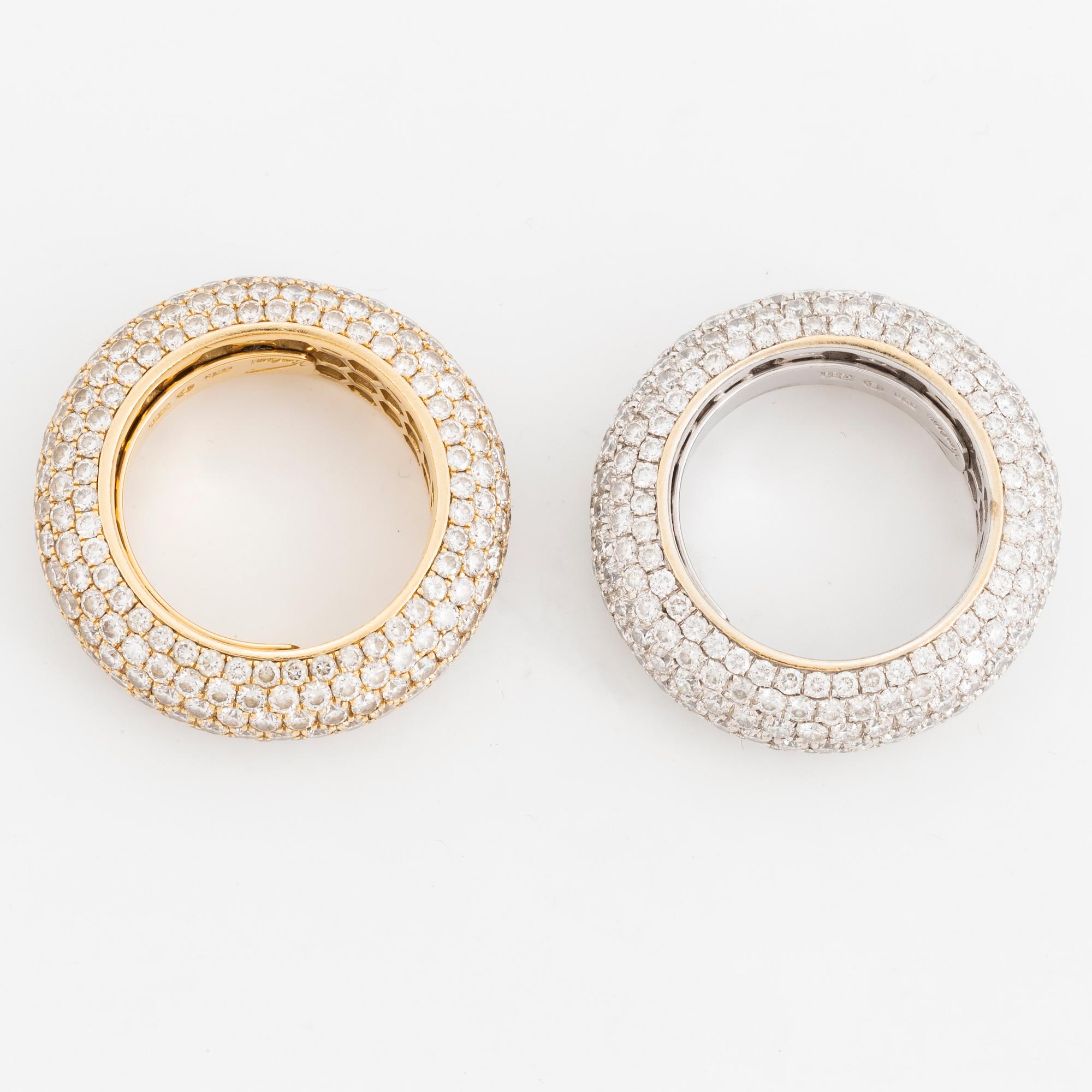 Two brilliant-cut diamond rings.