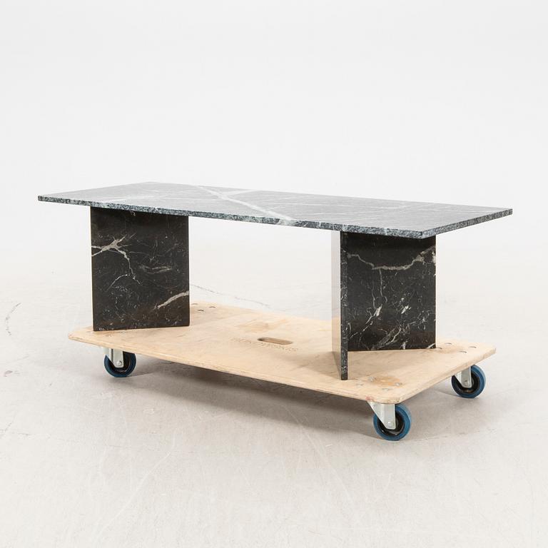 A marble coffee table alter part of the 20th century/21st century.