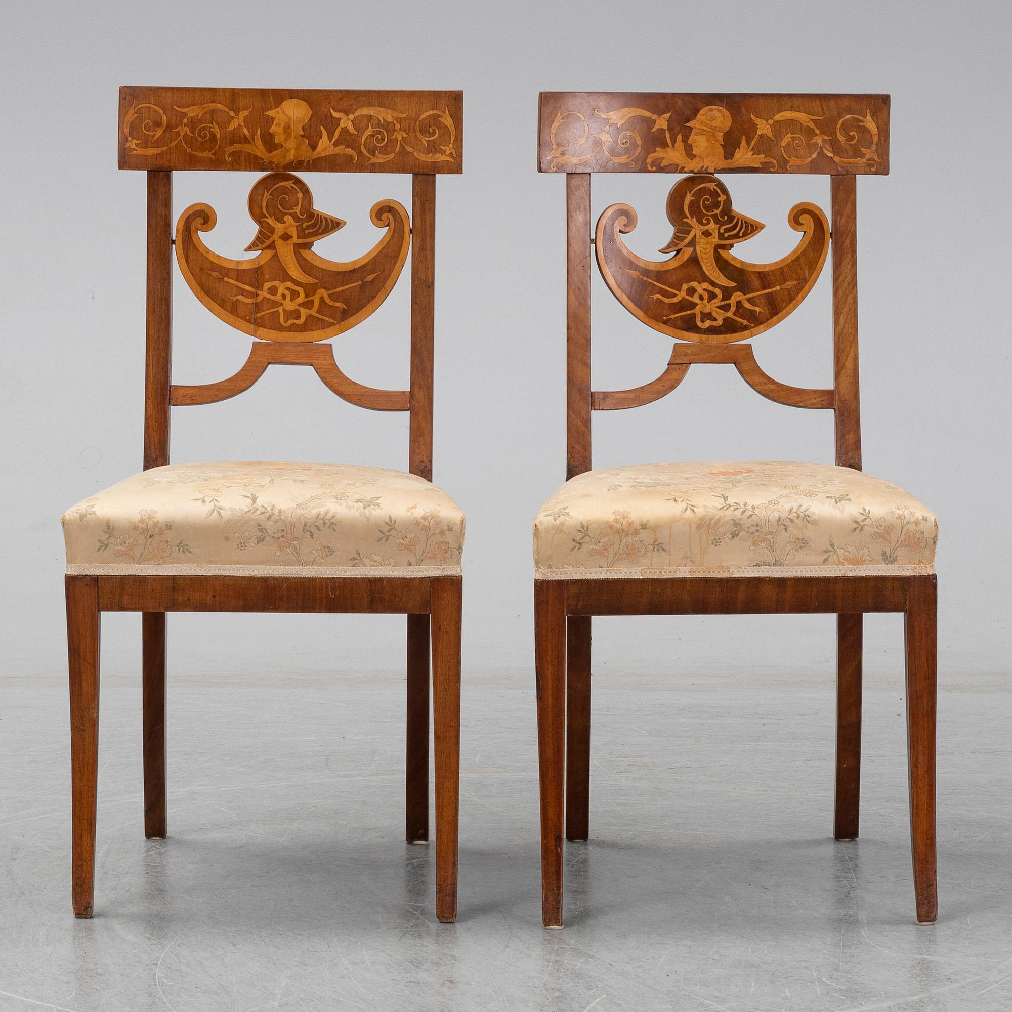 A pair of Royal Empire chairs, first half of the 19th Century.