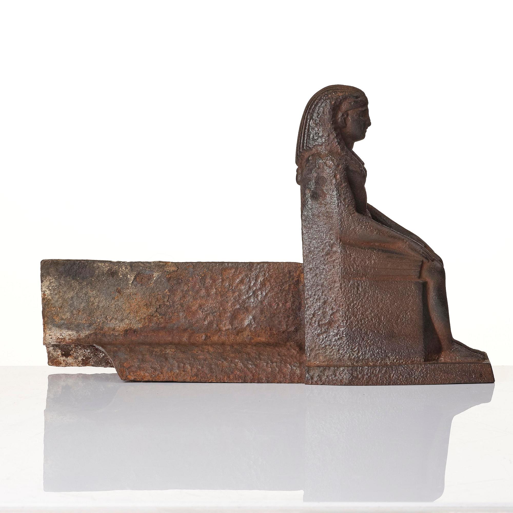 A pair of French Empire cast iron chenets, first part 19th century.