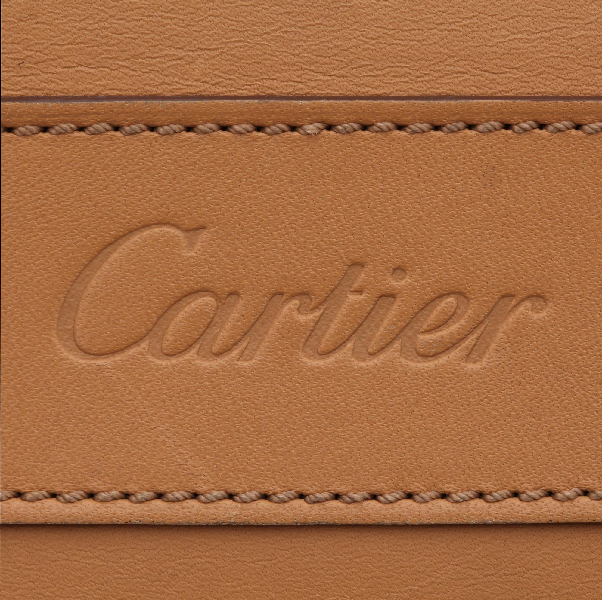 CARTIER, a beige leather briefcase.