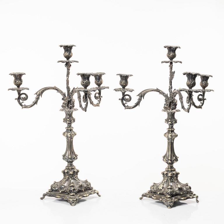 A pair of silver plated Rococo style candelabra, 20th century.