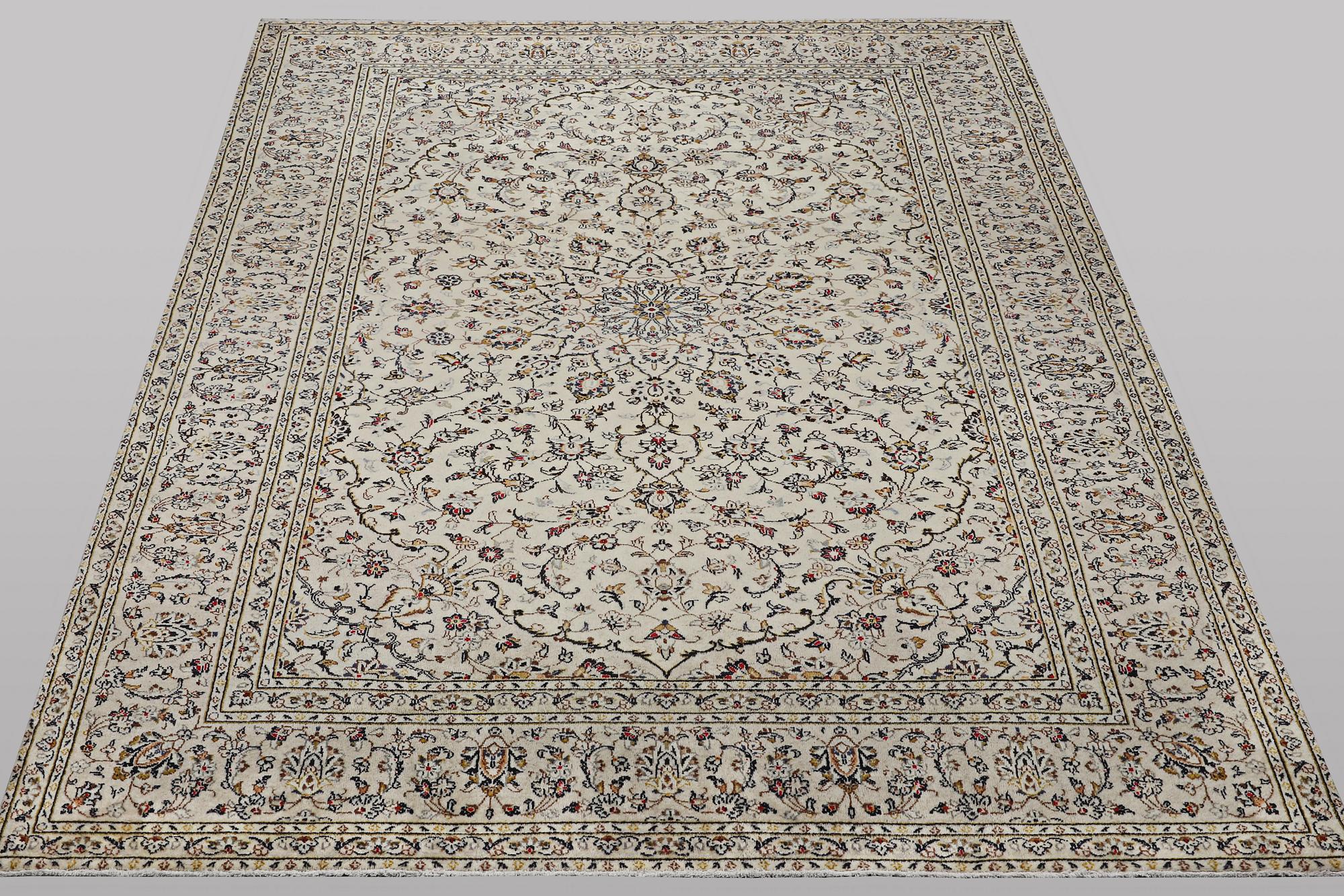 A carpet, Kashan, ca 328 x 205 cm.