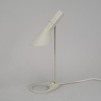 Arne Jacobsen, an 'AJ' grey lacquered table lamp, probably Axel Annell on license by Louis Poulsen, Denmark.