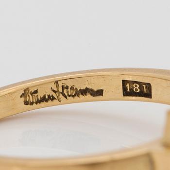 Wiwen Nilsson, an 18k gold ring with a facet cut rock crystal, Lund 1962.