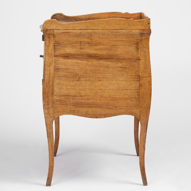 A Swedish rococo chamberpot cupboard, later part 18th century.