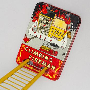 A tinplate Marx toys "The Climbing Fireman", 1950/60s.