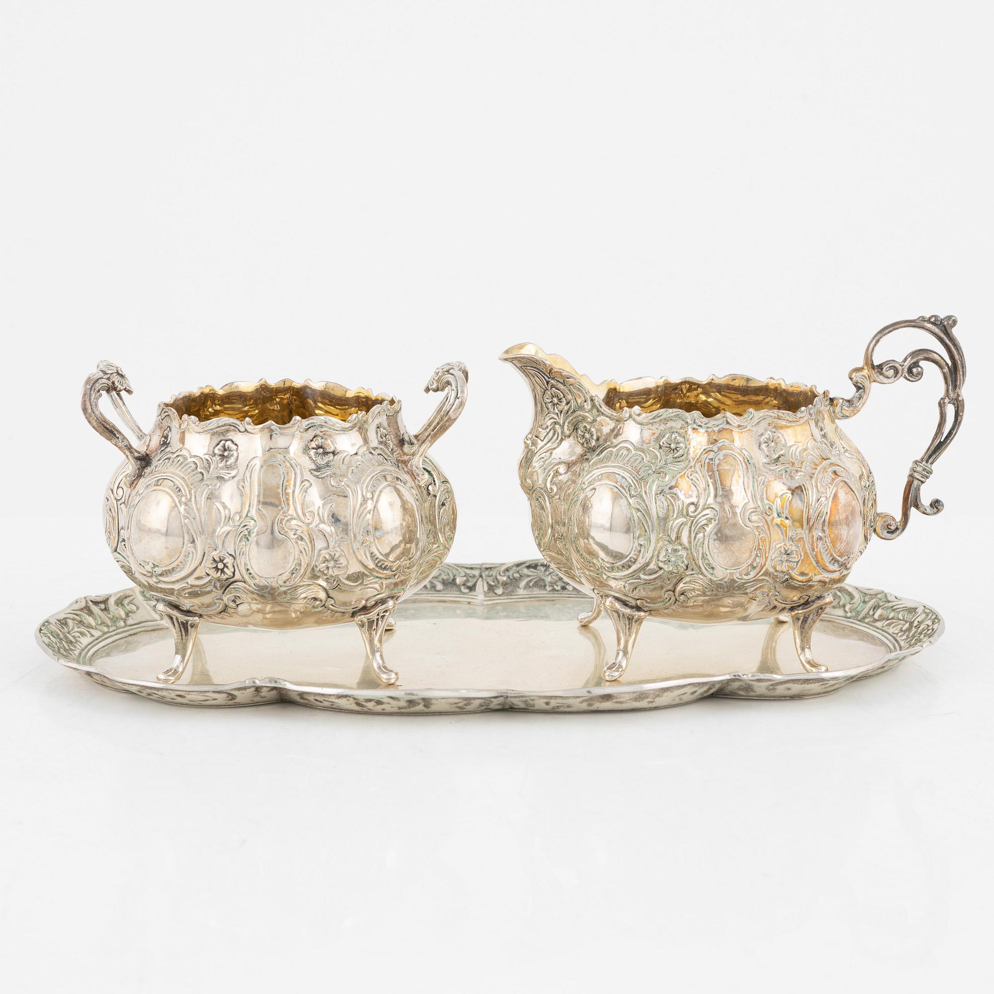 A silver Rococo style creamer, sugar bowl and tray, Gewe Silvervarufabriken Ab, Malmö, Sweden, 1970-71.