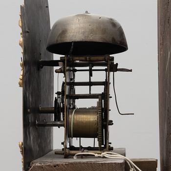 A 18th century longcase clock.