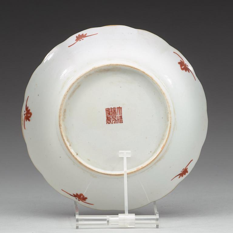 A famille rose plate with horses, circa 1900 with Daoguang mark.