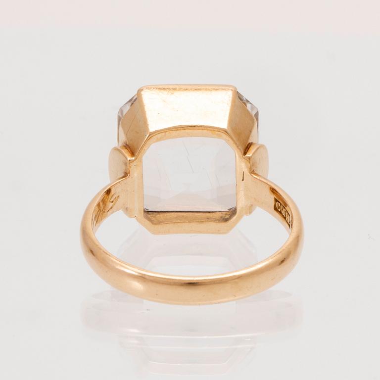 Ring och örhängen 18K guld samt fasettslipade bergskristaller.