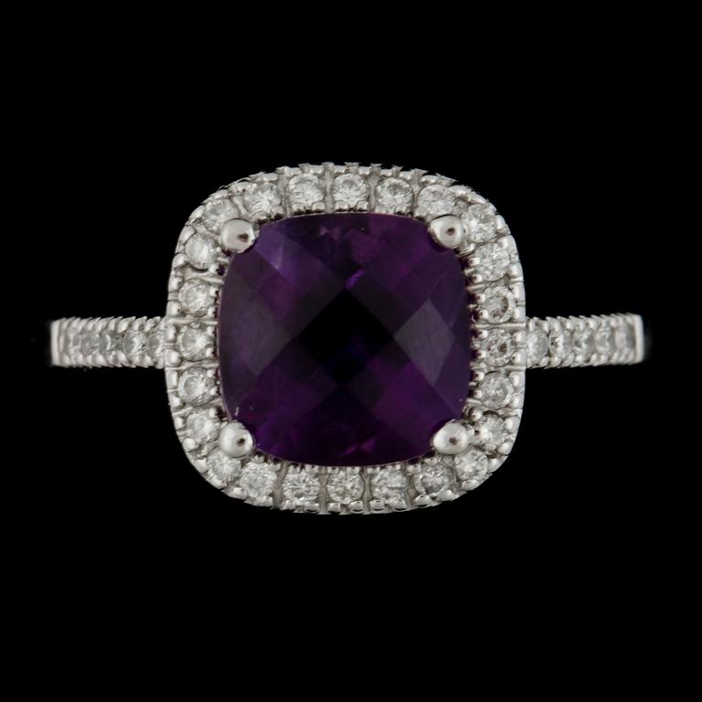 RING, 14k vitguld med ametist ca8x8xmm och briljantslipade diamanter tot ca0,17ct. Vikt 3,9g.