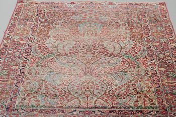 A RUG, a semi-antique Kerman Laver, ca 203 x 130,5 cm.