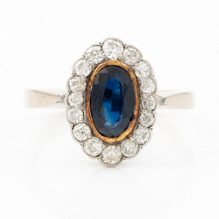 Ring, camrose model, 18K white gold with sapphire and old-cut diamonds.