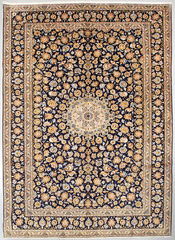 A Keshan rug, 415 x 303 cm.