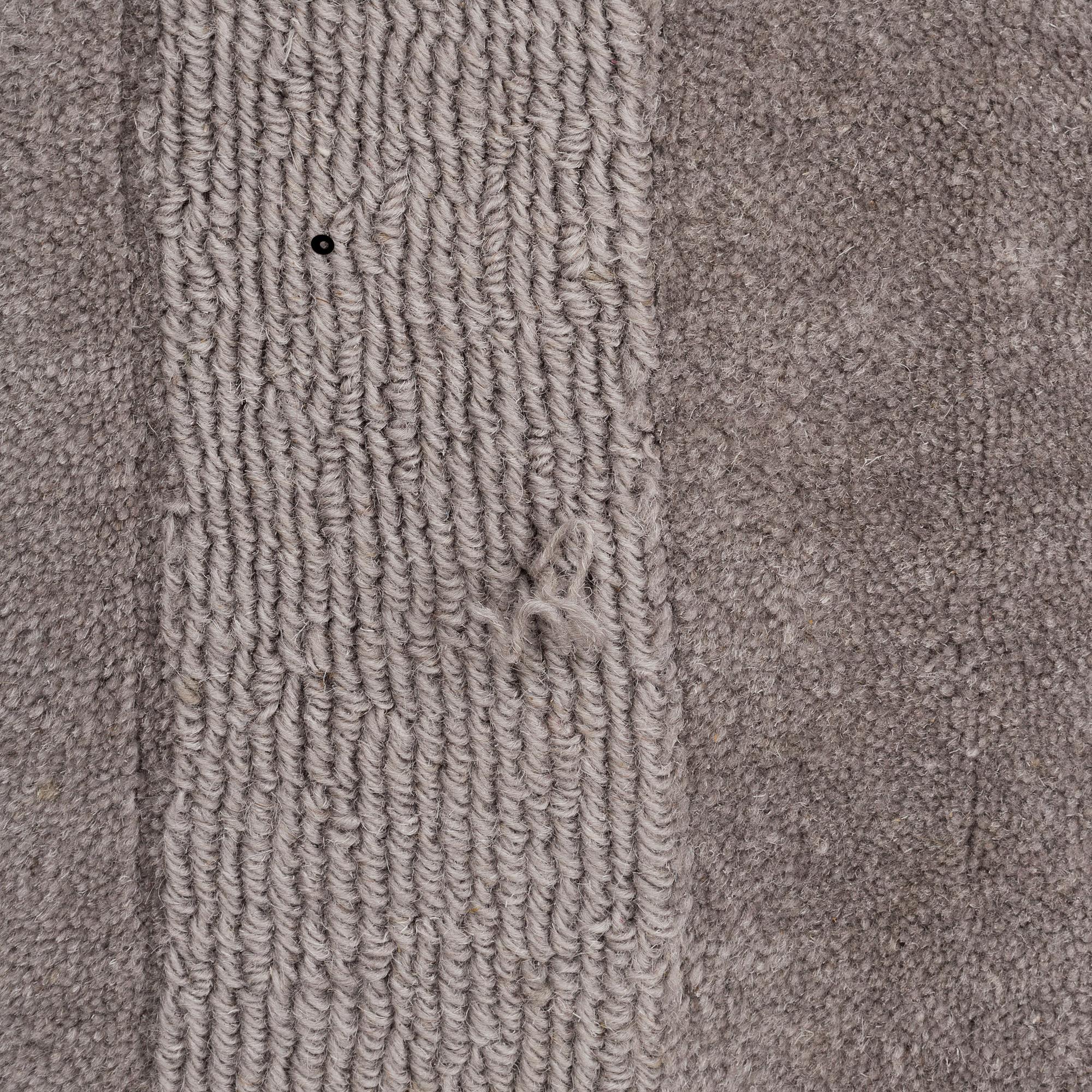 A Layered "Wool Cubes" carpet, 390x620 cm.