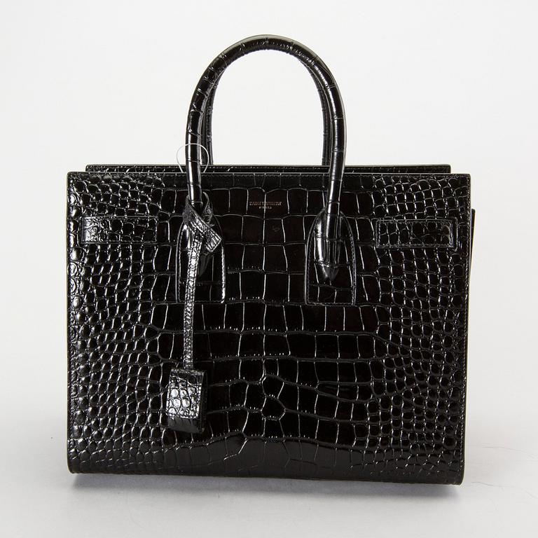 YVES SAINT LAURENT, a crocodile embossed green leather 'Sac du Jour small'.