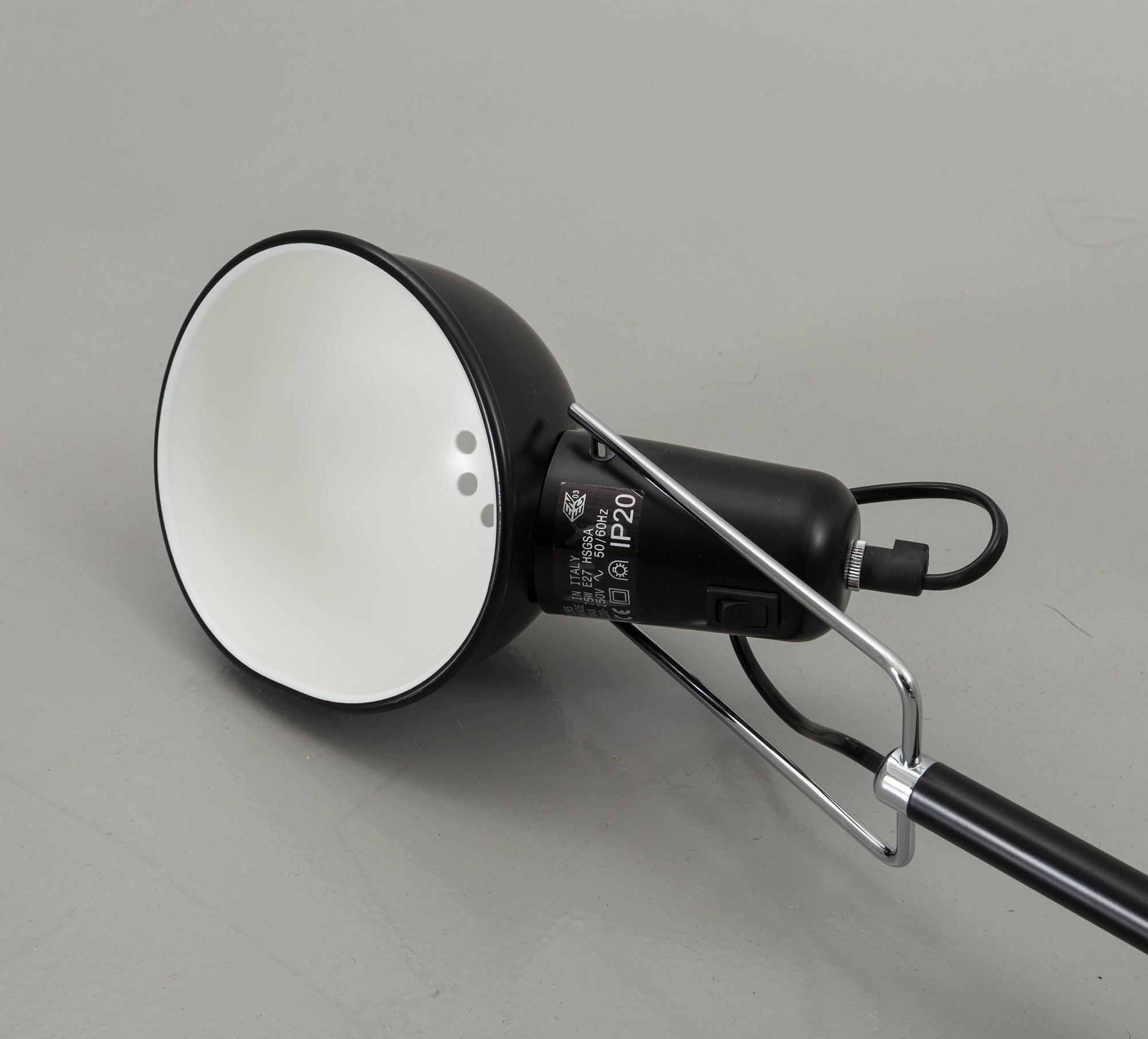 A FLOS WALL LAMP, MODEL 265. Designed by Paolo Rizzatto.