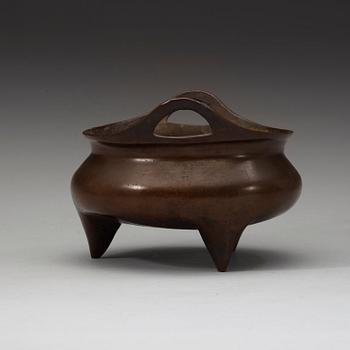 A bronze tripod cencer, Ming dynasty.