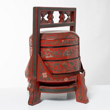 A group of three red wooden vessels, China/Southeast Asia, 20th century.