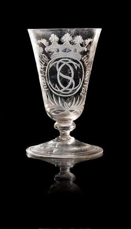 A Swedish wine glass, Kungsholm´s glass manufactory, engraved Steninge and dated 1705.