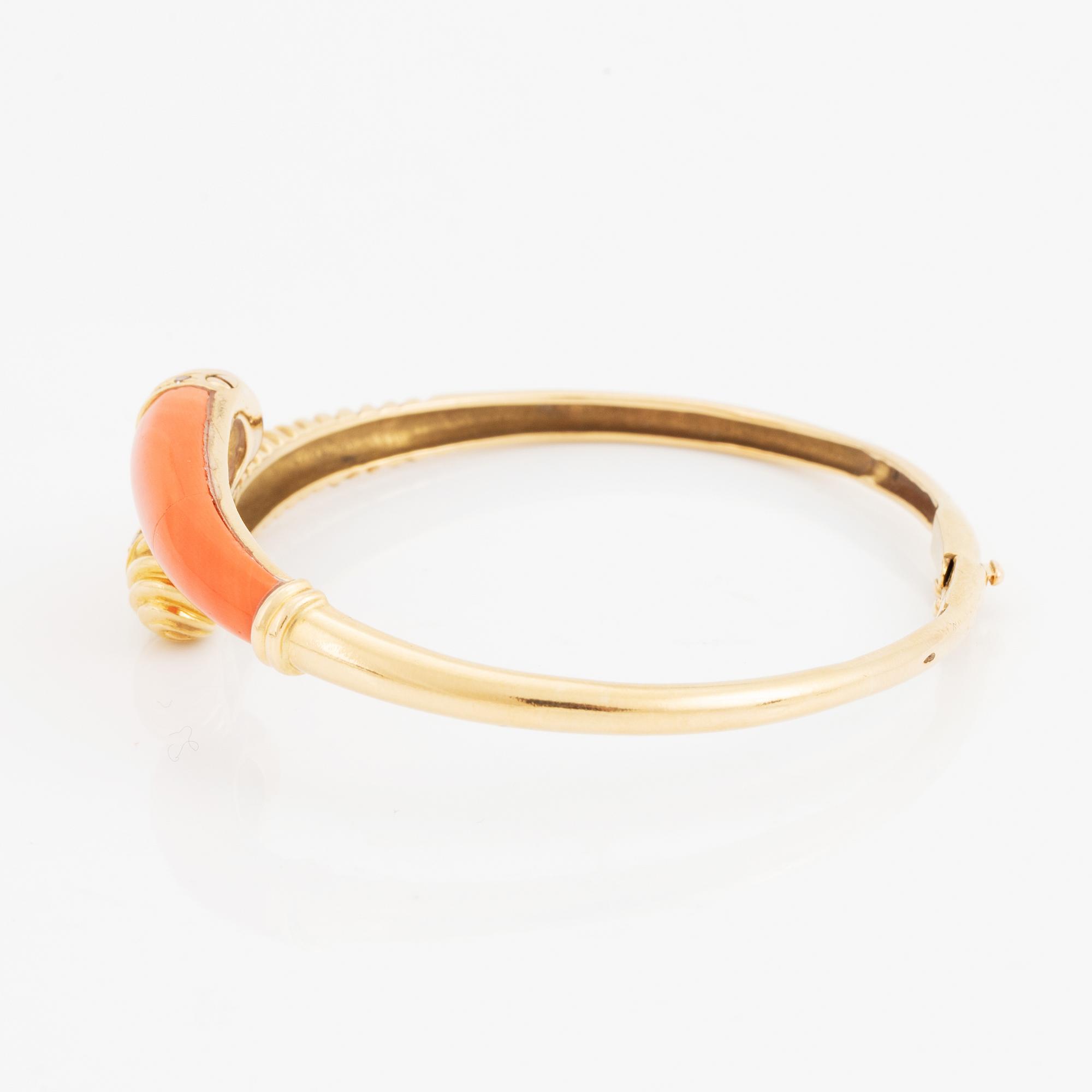 Gold and coral and diamond bangle.