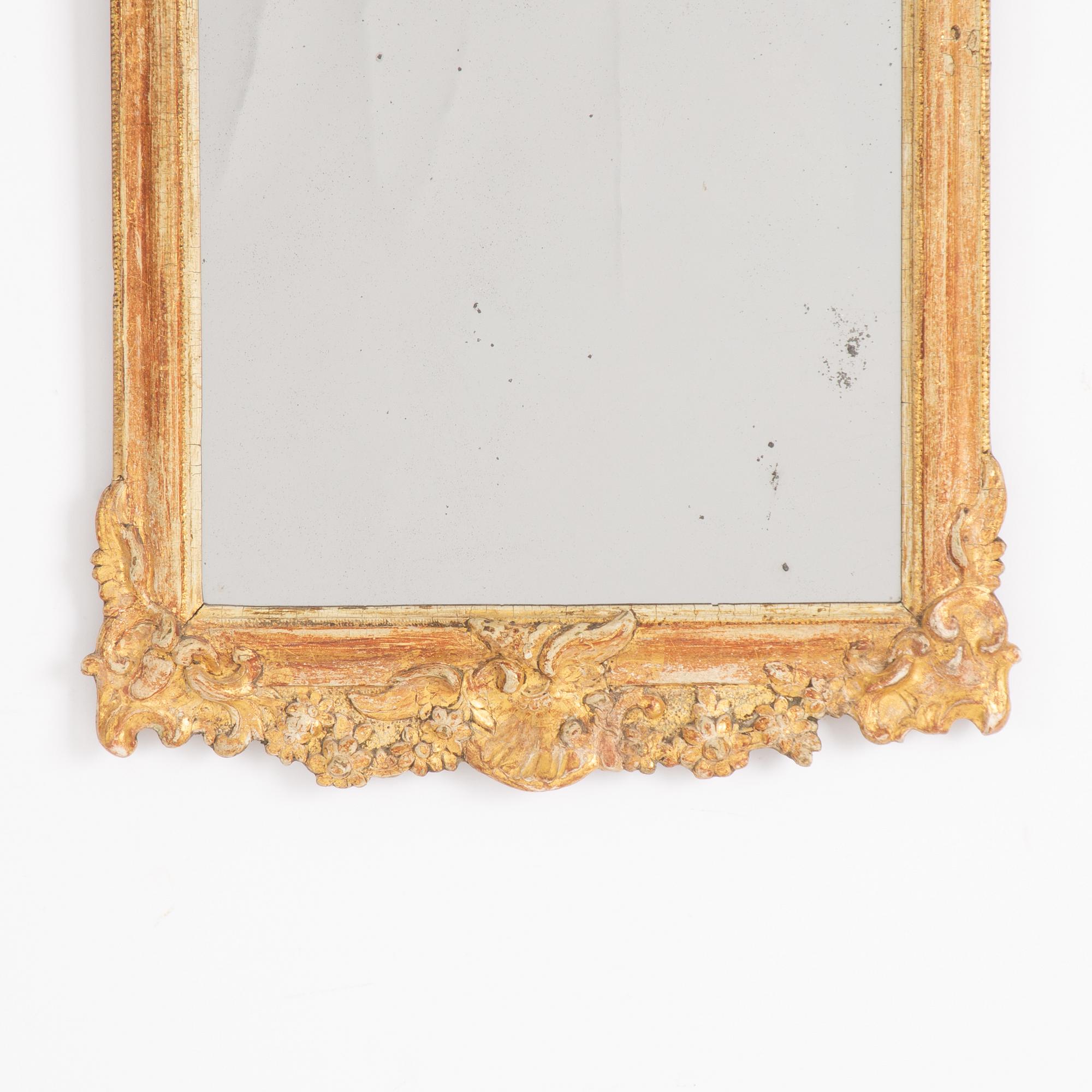 A rococo mirror, second half of the 18th century.