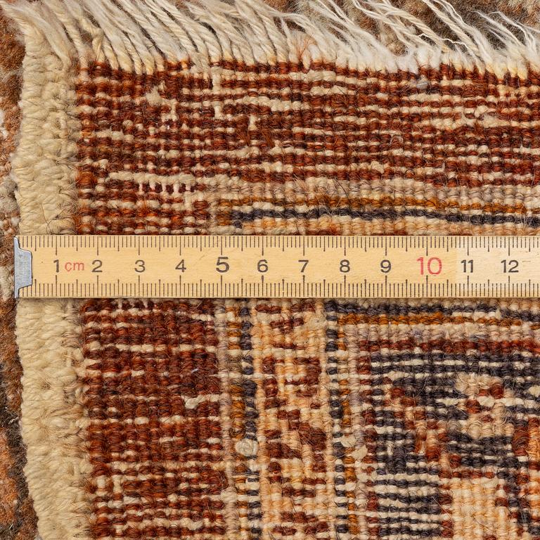 An antique Tabriz carpet, Northwest Persia, 453 x 310 cm.
