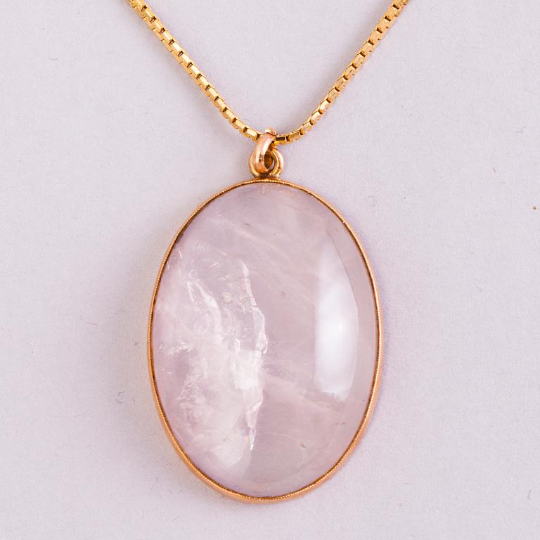 A 1950s three piece jewellery set with 14K gold and rose quartz.