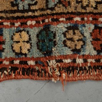 A Heriz runner, ca 310 x 85 cm.