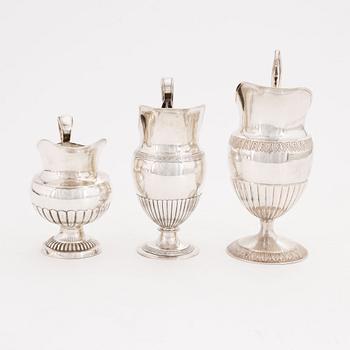 A set of three Swedish silver Empire jugs, first part of the 19th Century.