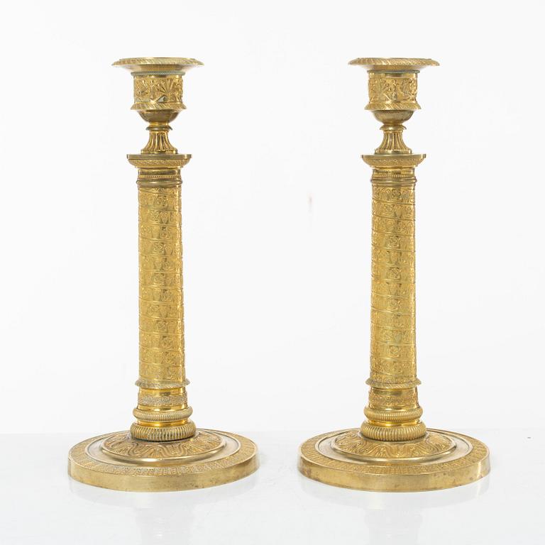 A pair of Empire candlesticks, France, early 19th Century.