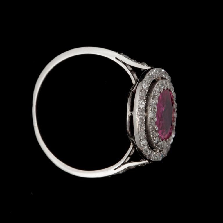 A 2.05 ct untreated Burmese ruby surrounded by old-cut diamonds, total carat weight circa 0.50 ct.