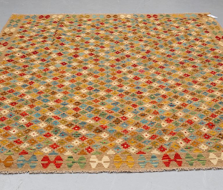 A CARPET, kilim, ca 285 x 209 cm.