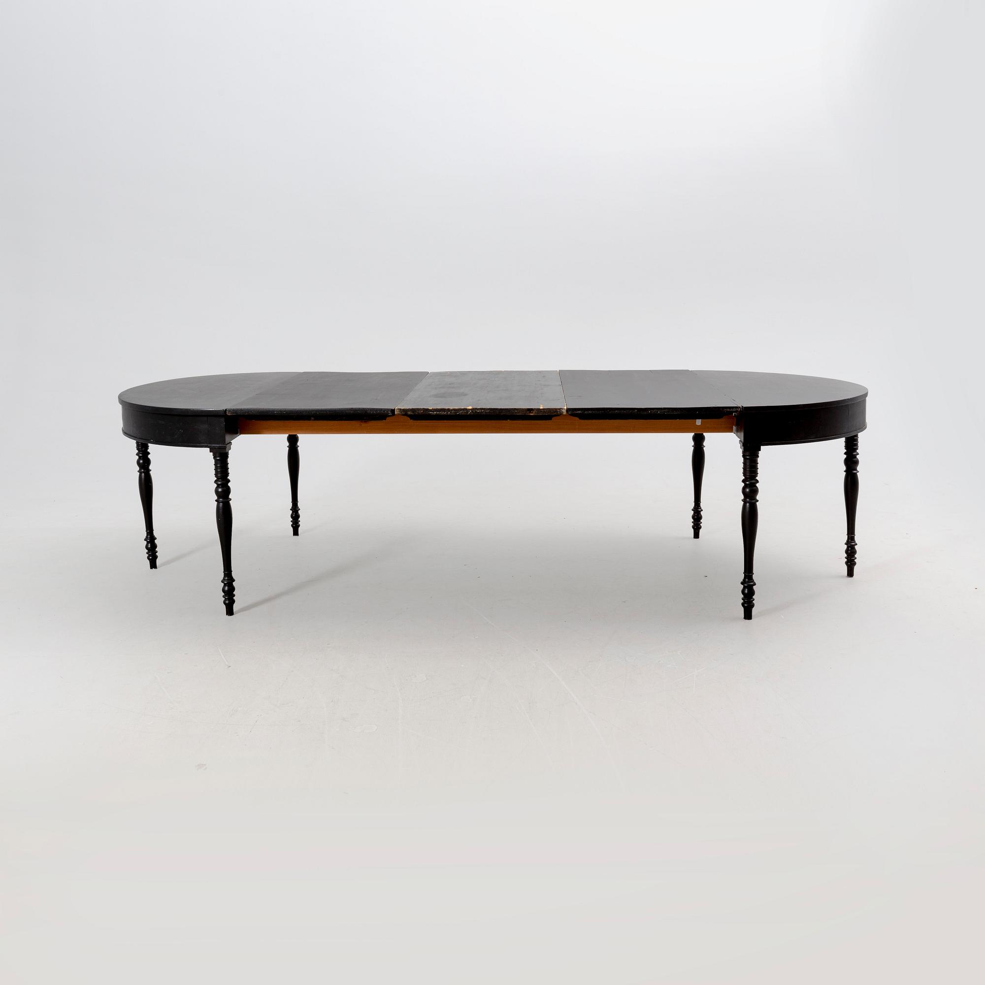 A mid 18th century painted dining table.