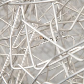 A 'Fil de Fer Ovale' ceiling light by Enzo Cattelini.