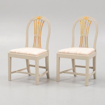 A pair of late Gustavian style chairs, Lindome, first half of the 19th century.