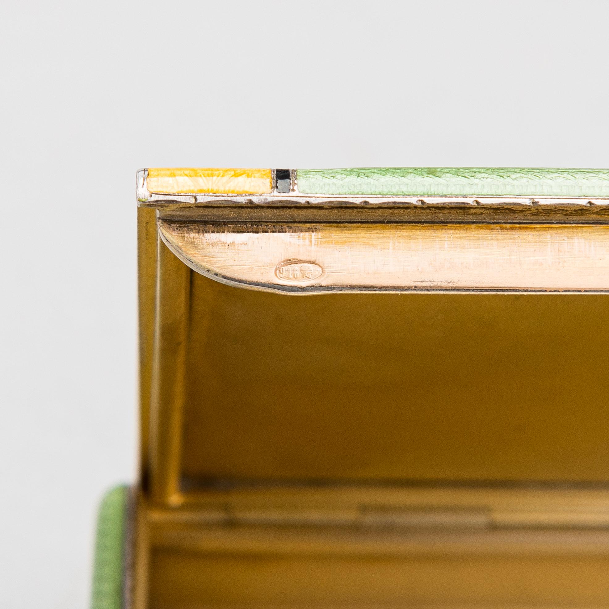 A gilded silver cigarette case with enamel and rose-cut diamonds. Moscow, early 20th century.