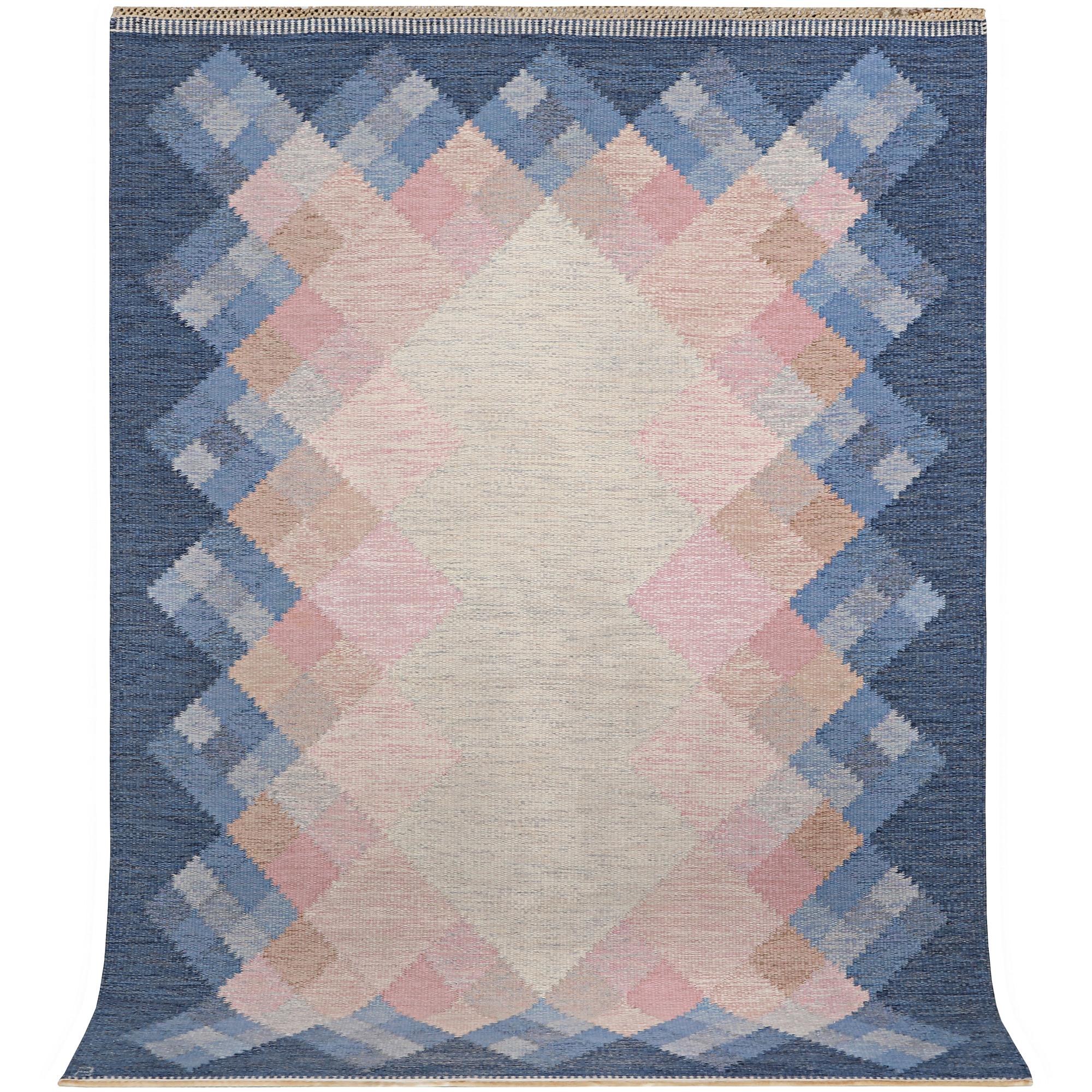 A flat weave carpet, signed S, ca 237 x 166 cm.