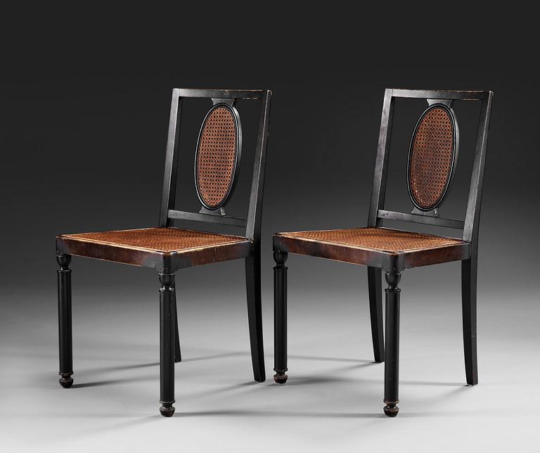 A pair of Axel-Einar Hjorth 'Coolidge' black stained chairs by NK 1927.