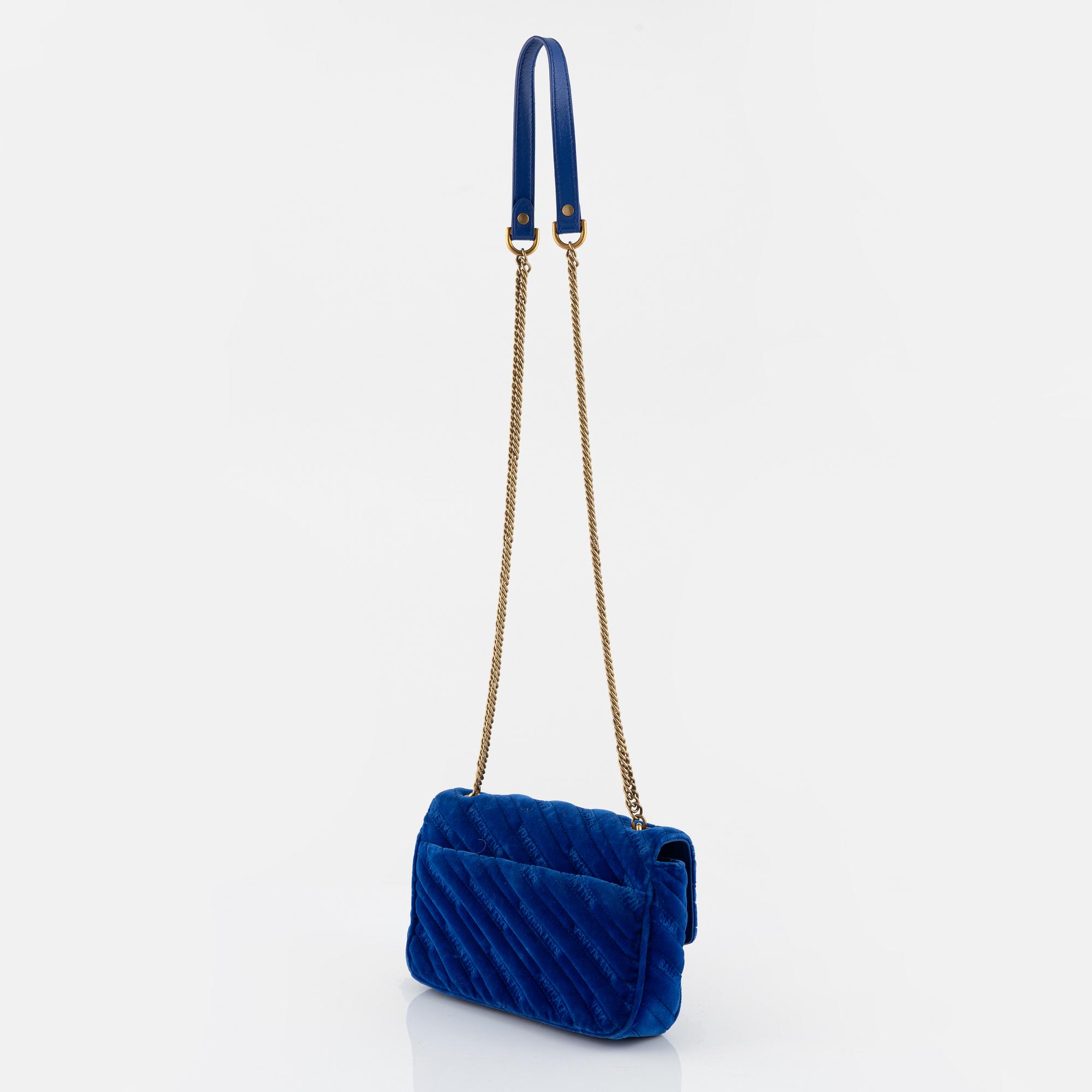 Balenciaga, a 'BB chain' blue velvet bag.