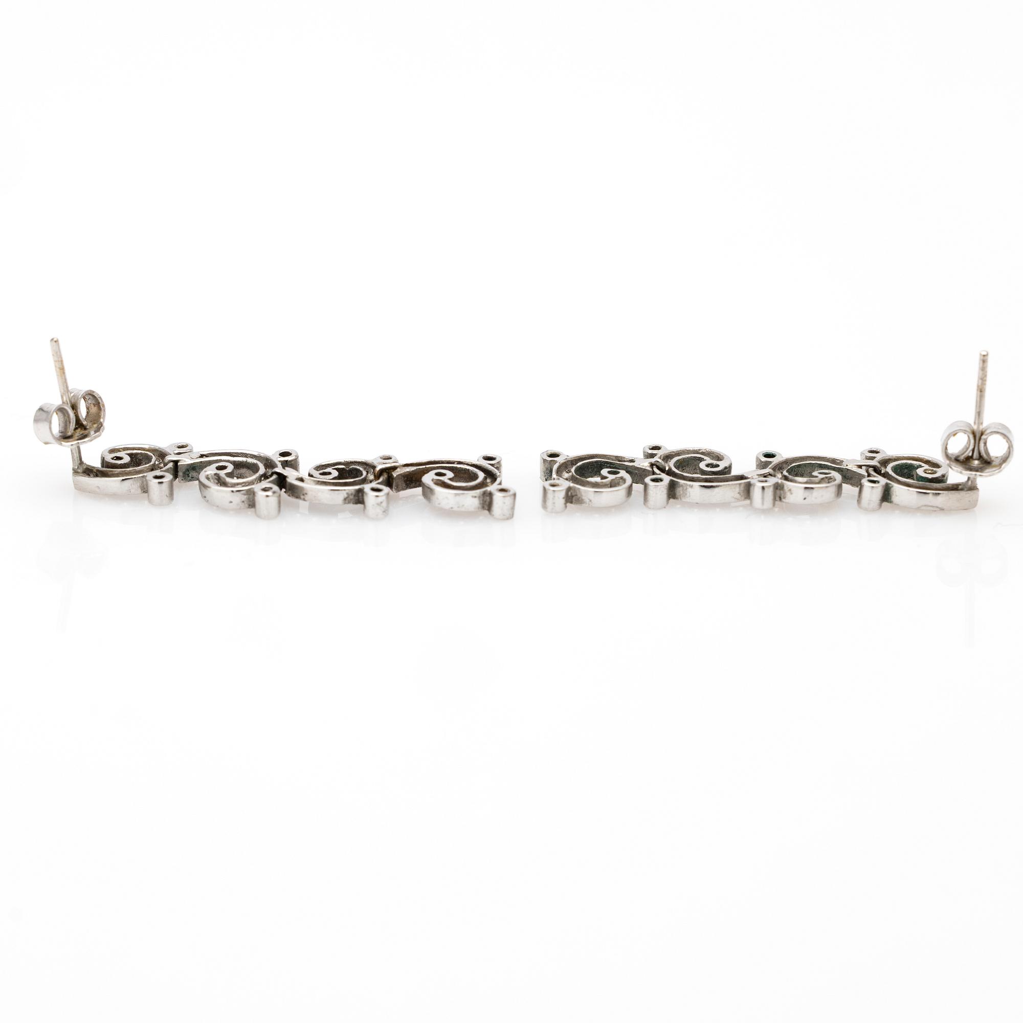 Earrings, a pair, white gold and brilliant-cut diamonds.