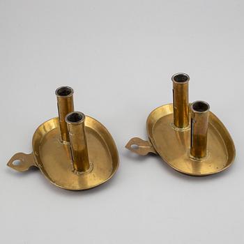 A pair of North European Brass double candelholders, 19th century.