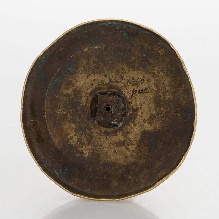 An early 19th century French Empire candlestick.